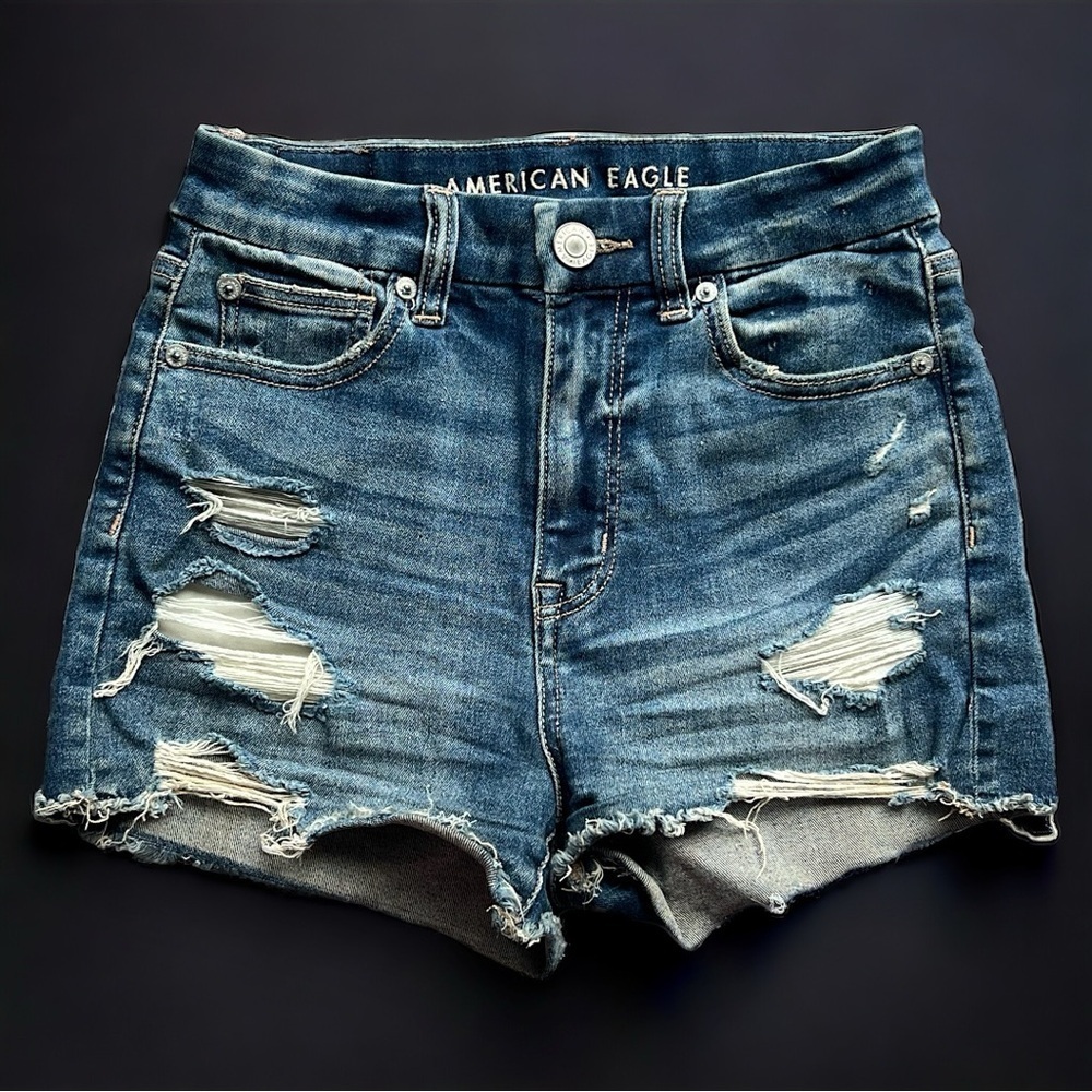 AE Next Level Stretch Curvy High Rise Shortie Distressed Denim Shorts